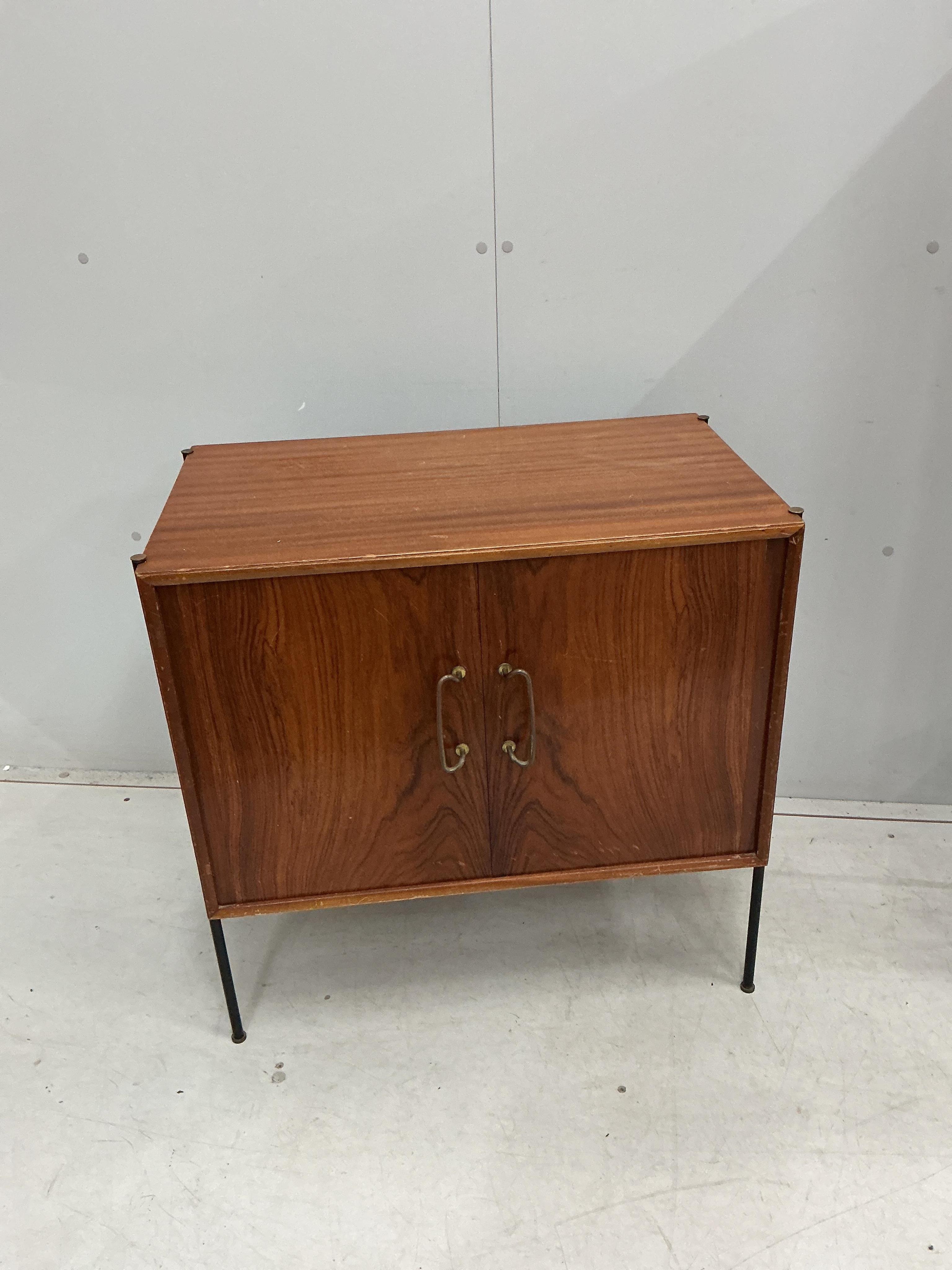 A mid century bookcase, width 70cm, depth 30cm, height 138cm together with a small cupboard